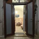 De Cristoforis 57, Traditional White Stone House