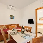 Stella Marina Residence With Shared Pool - Happy Rentals
